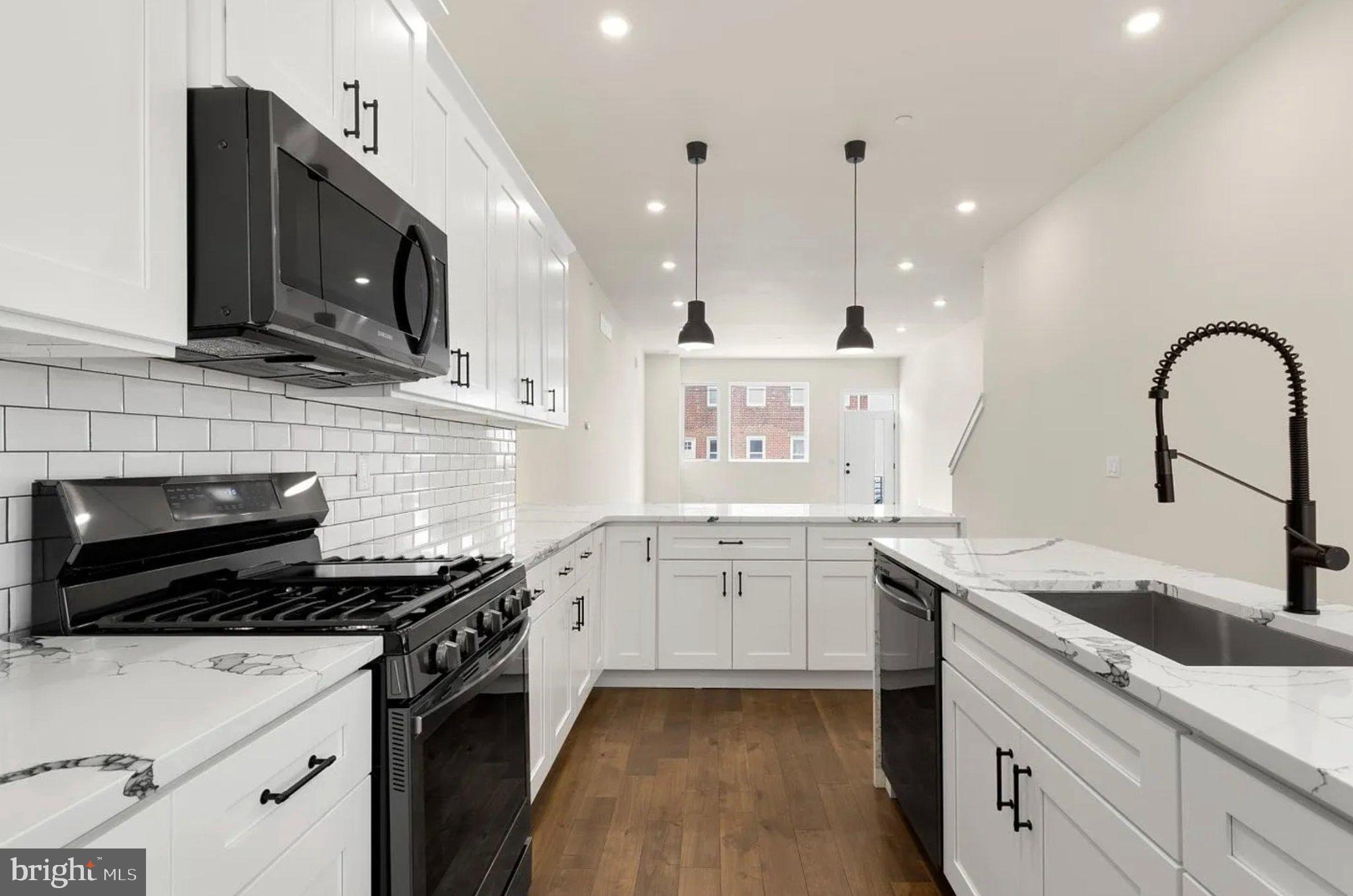 2719 Lefevre Street Philadelphia, PA 19137 - Photo 10 of 33 Modern kitchen with sleek finishes.