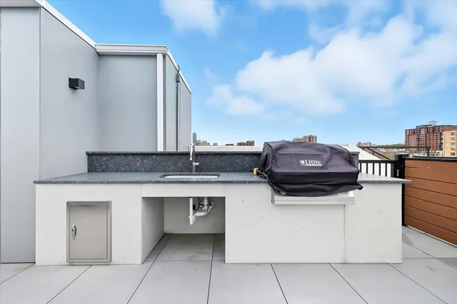 a view of terrace with seating space and barbeque oven