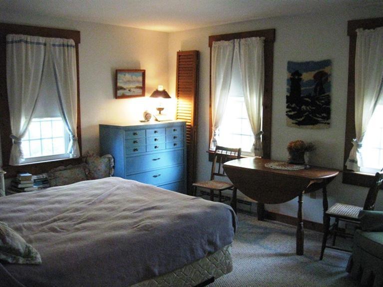 1250 Samoset Road Eastham, MA 02642 - Photo 21 of 29 a bedroom with a bed and a window
