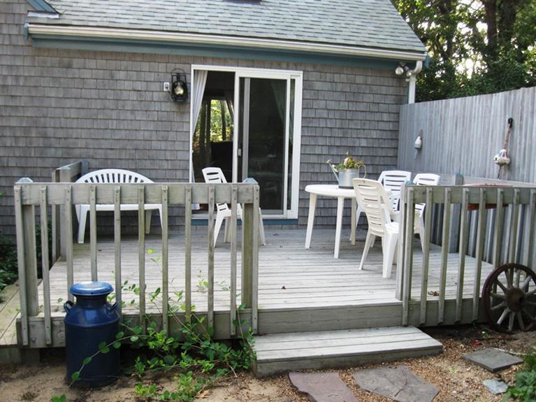 1250 Samoset Road Eastham, MA 02642 - Photo 10 of 29 a view of a dinning tables and chairs in patio