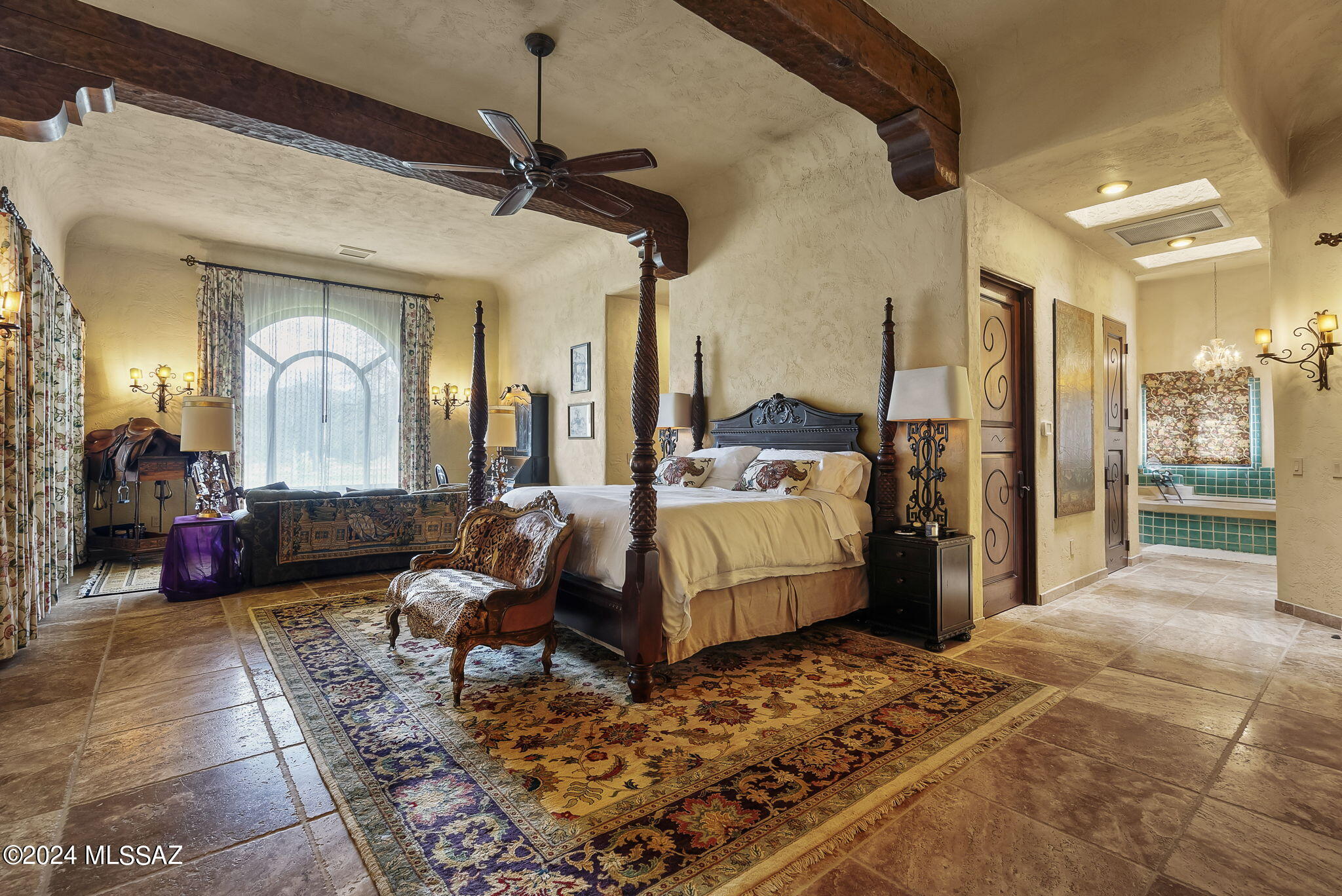 45 Clark Crossing Road Tumacacori, AZ 85640 - Photo 20 of 50 a bed room with a bed and a couch