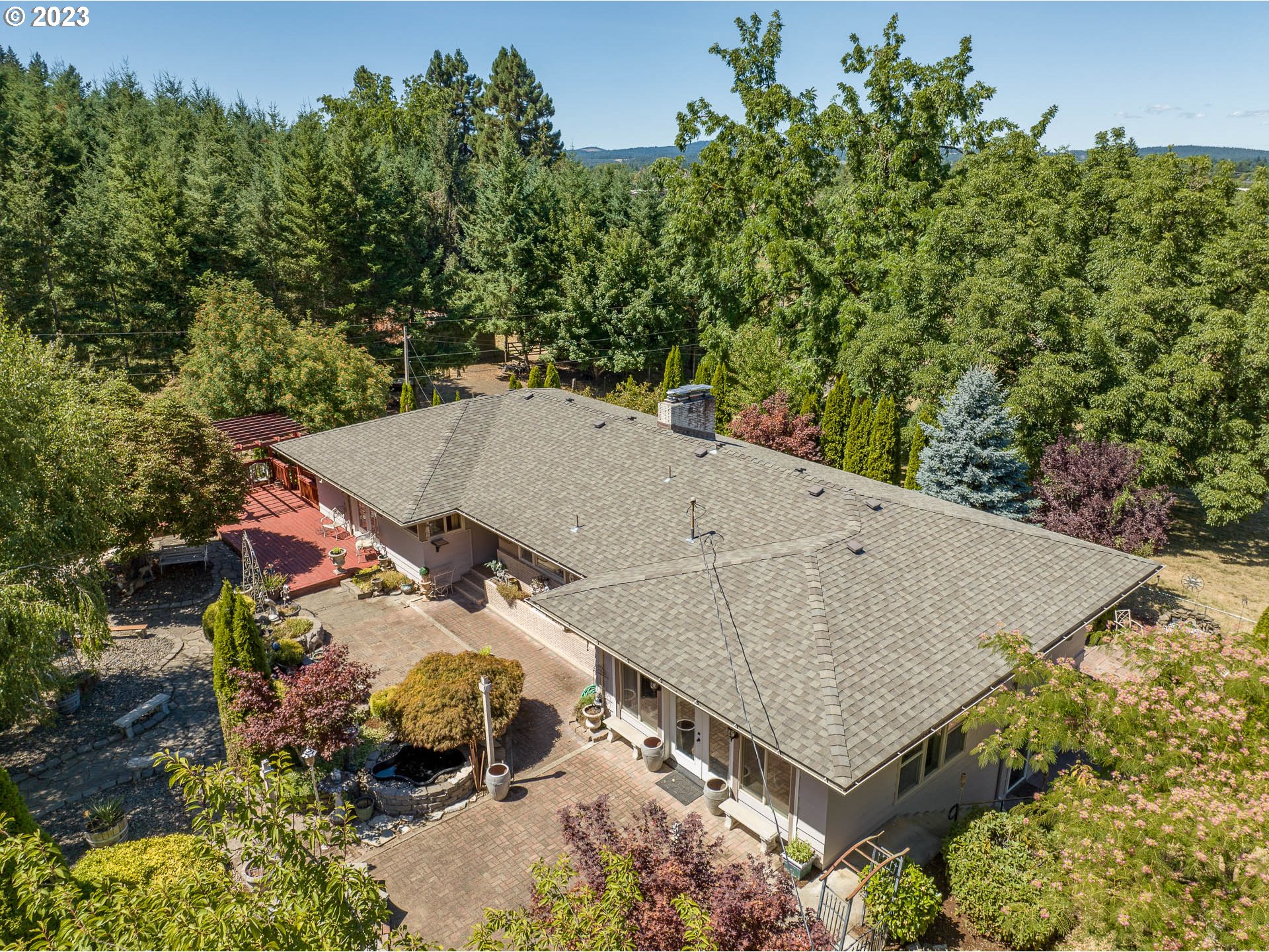 12750 Clow Corner Road Dallas, OR 97338 - Photo 1 of 43 an aerial view of a house having yard