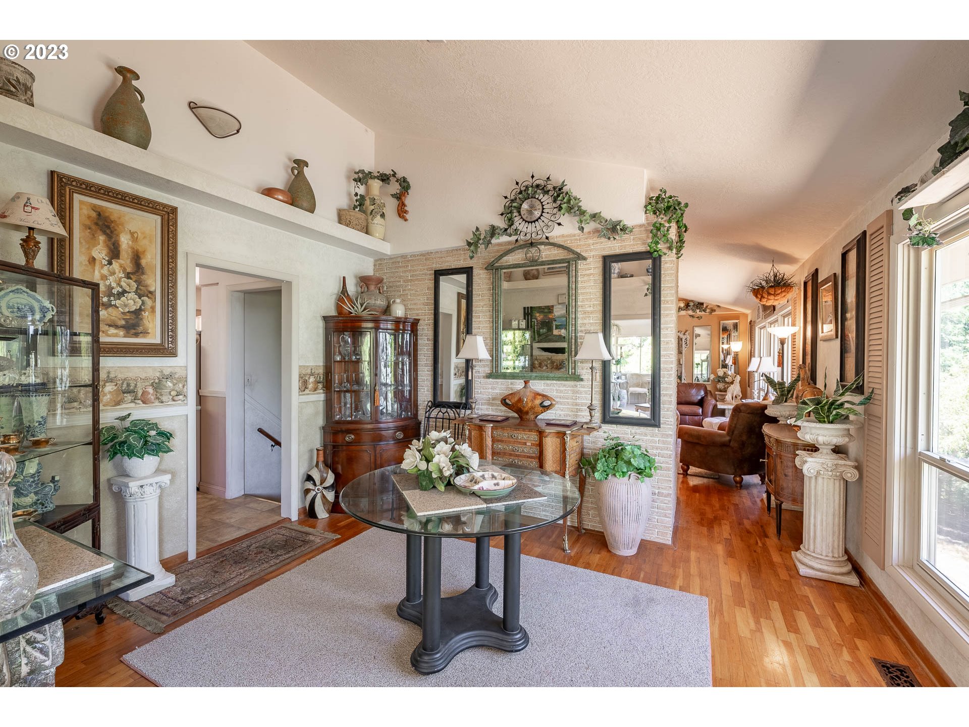 12750 Clow Corner Road Dallas, OR 97338 - Photo 11 of 43 a living room with furniture and wooden floor
