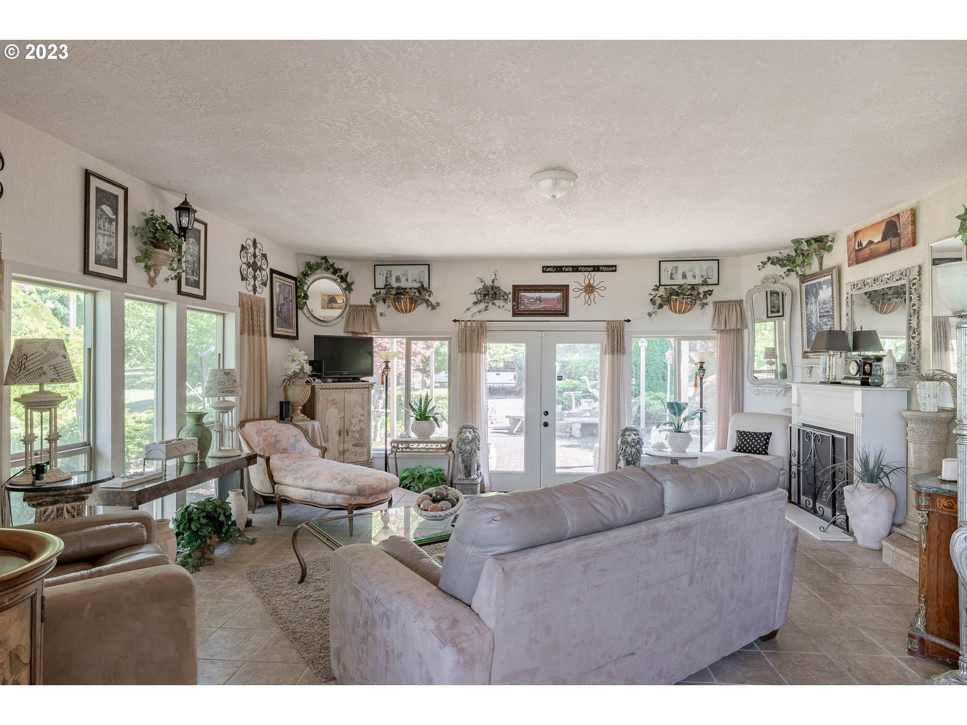 12750 Clow Corner Road Dallas, OR 97338 - Photo 15 of 43 a living room with furniture and a large window