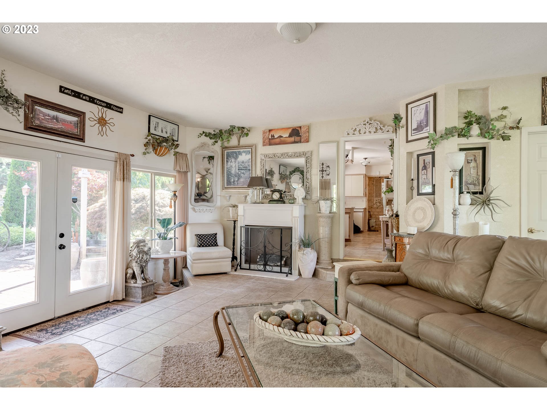 12750 Clow Corner Road Dallas, OR 97338 - Photo 16 of 43 a living room with furniture and a fireplace