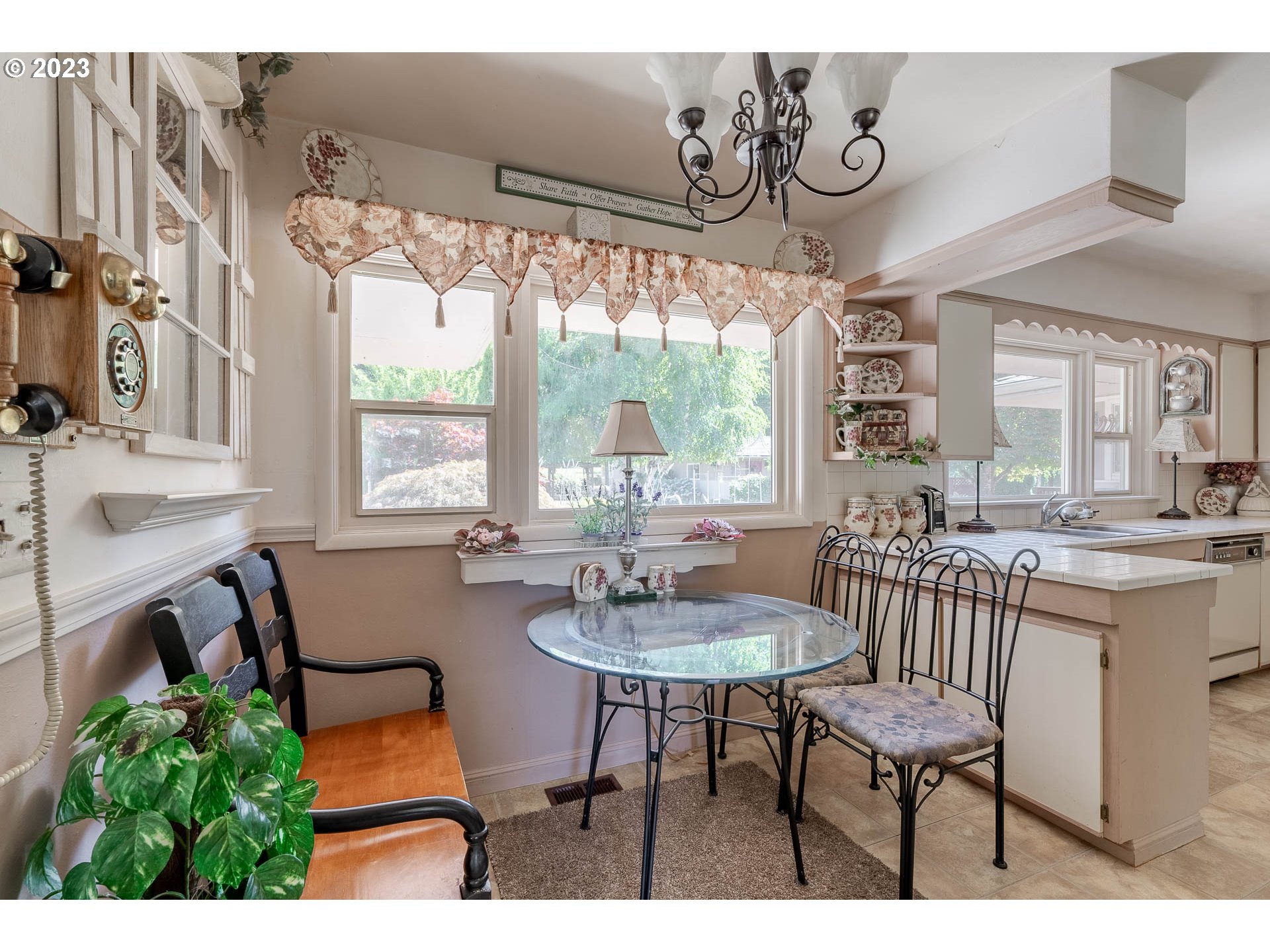 12750 Clow Corner Road Dallas, OR 97338 - Photo 17 of 43 a view of a dining room with furniture window and outside view