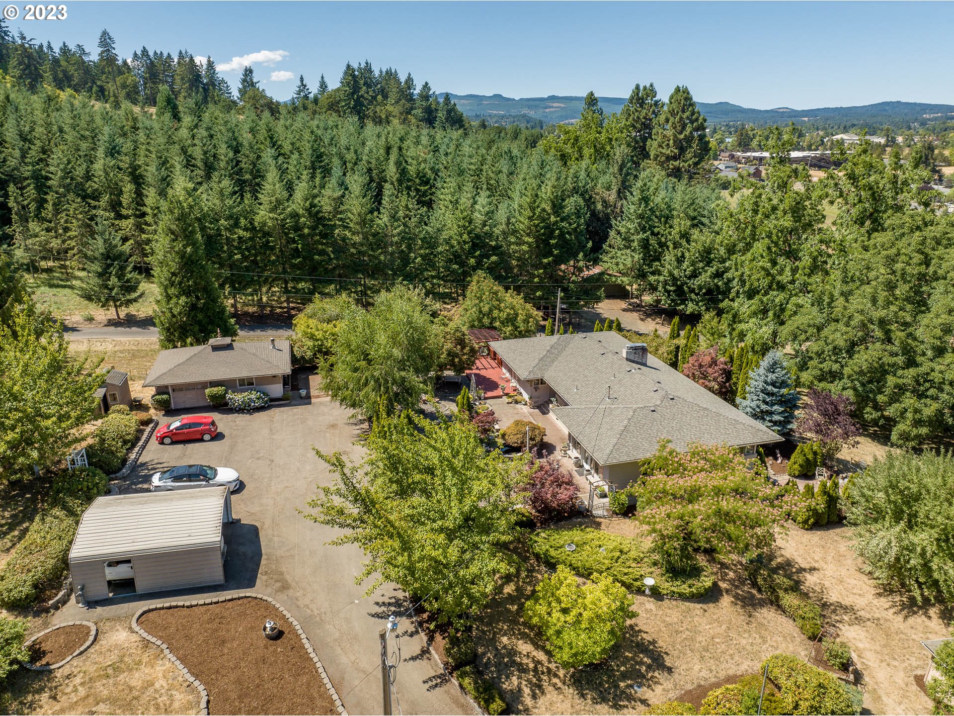 12750 Clow Corner Road Dallas, OR 97338 - Photo 2 of 43 an aerial view of a house with a yard