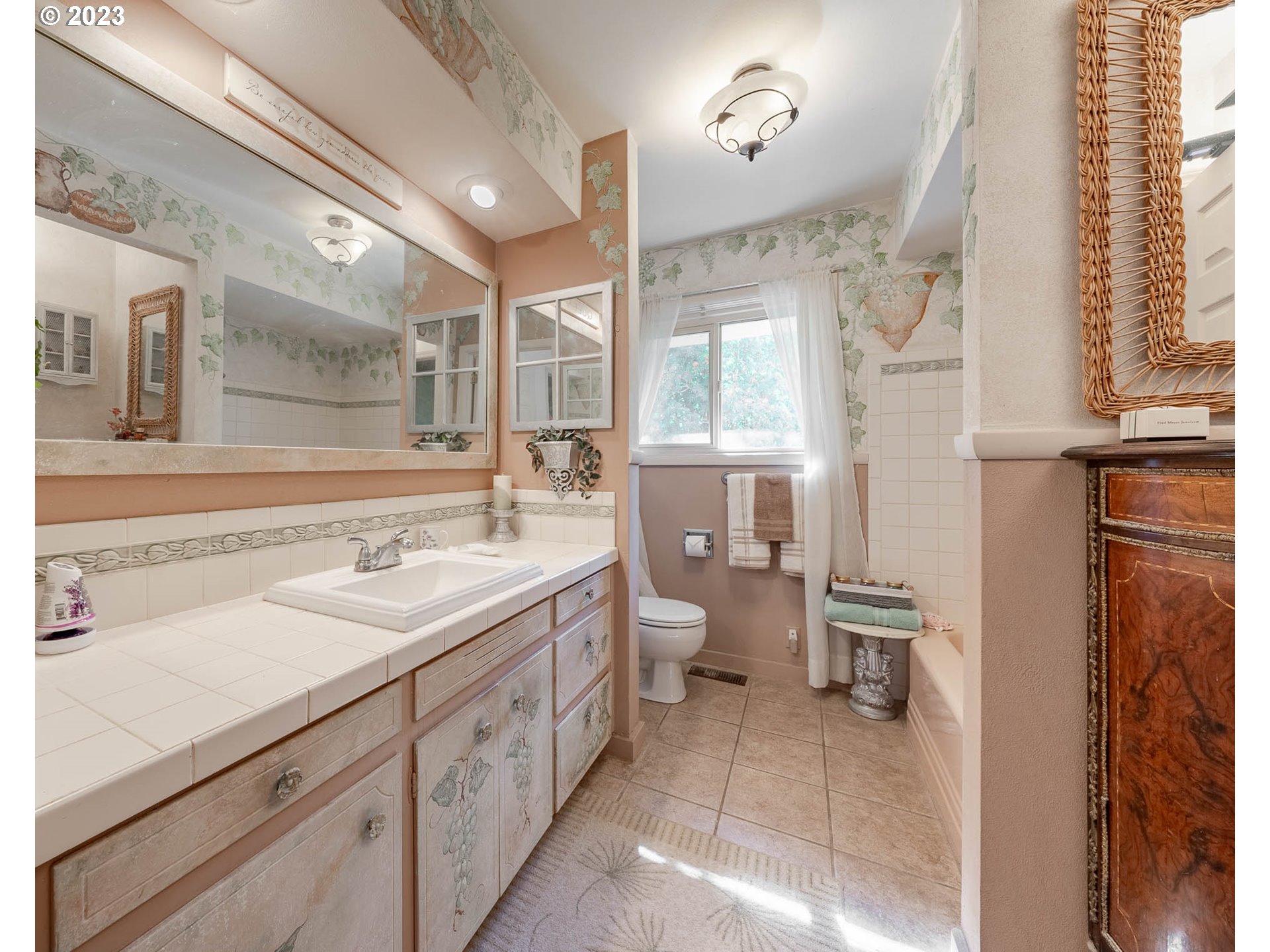 12750 Clow Corner Road Dallas, OR 97338 - Photo 26 of 43 a spacious bathroom with a double vanity sink a toilet and a shower