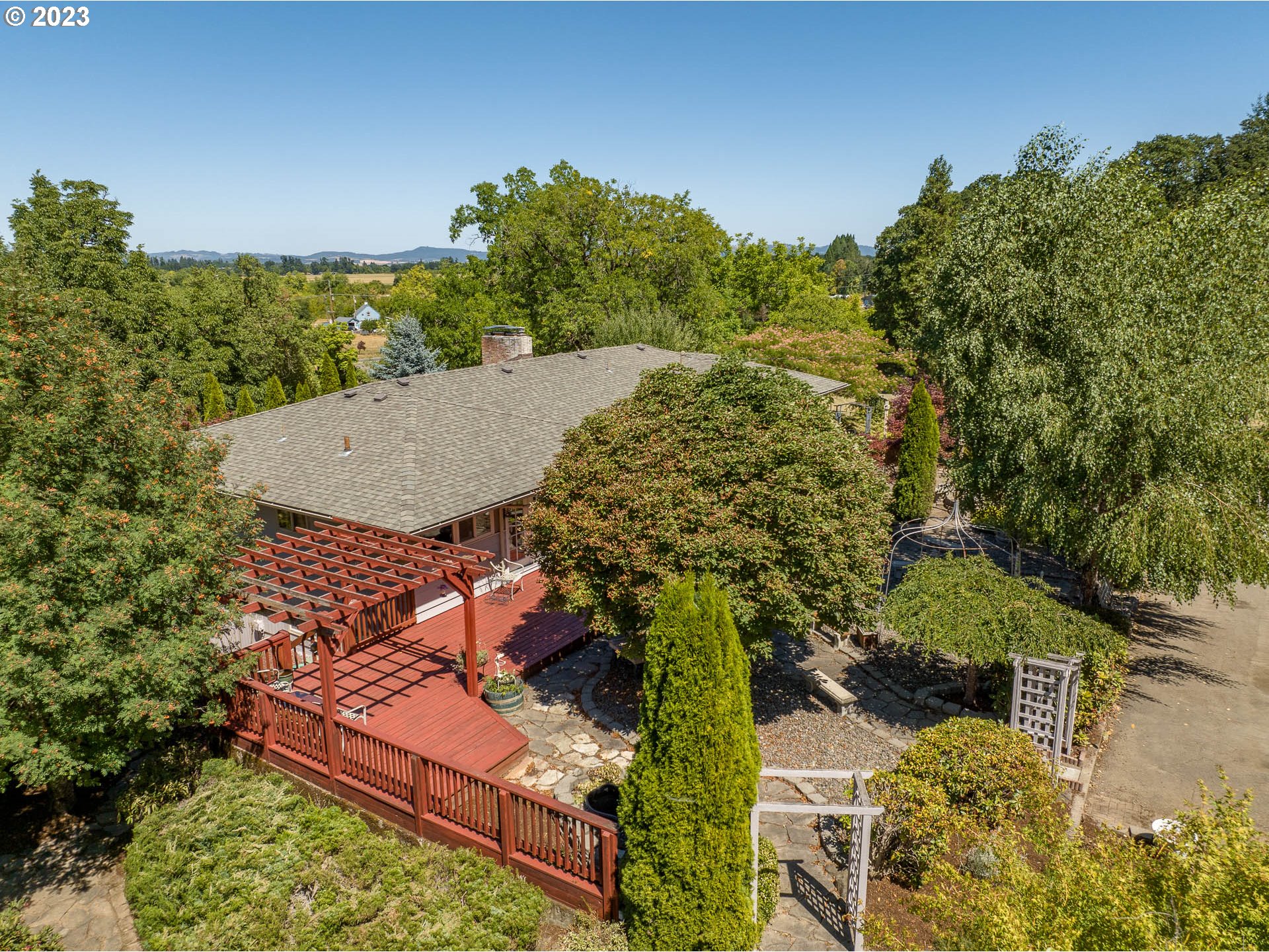 12750 Clow Corner Road Dallas, OR 97338 - Photo 35 of 43 an aerial view of a house with a yard basket ball court and outdoor seating
