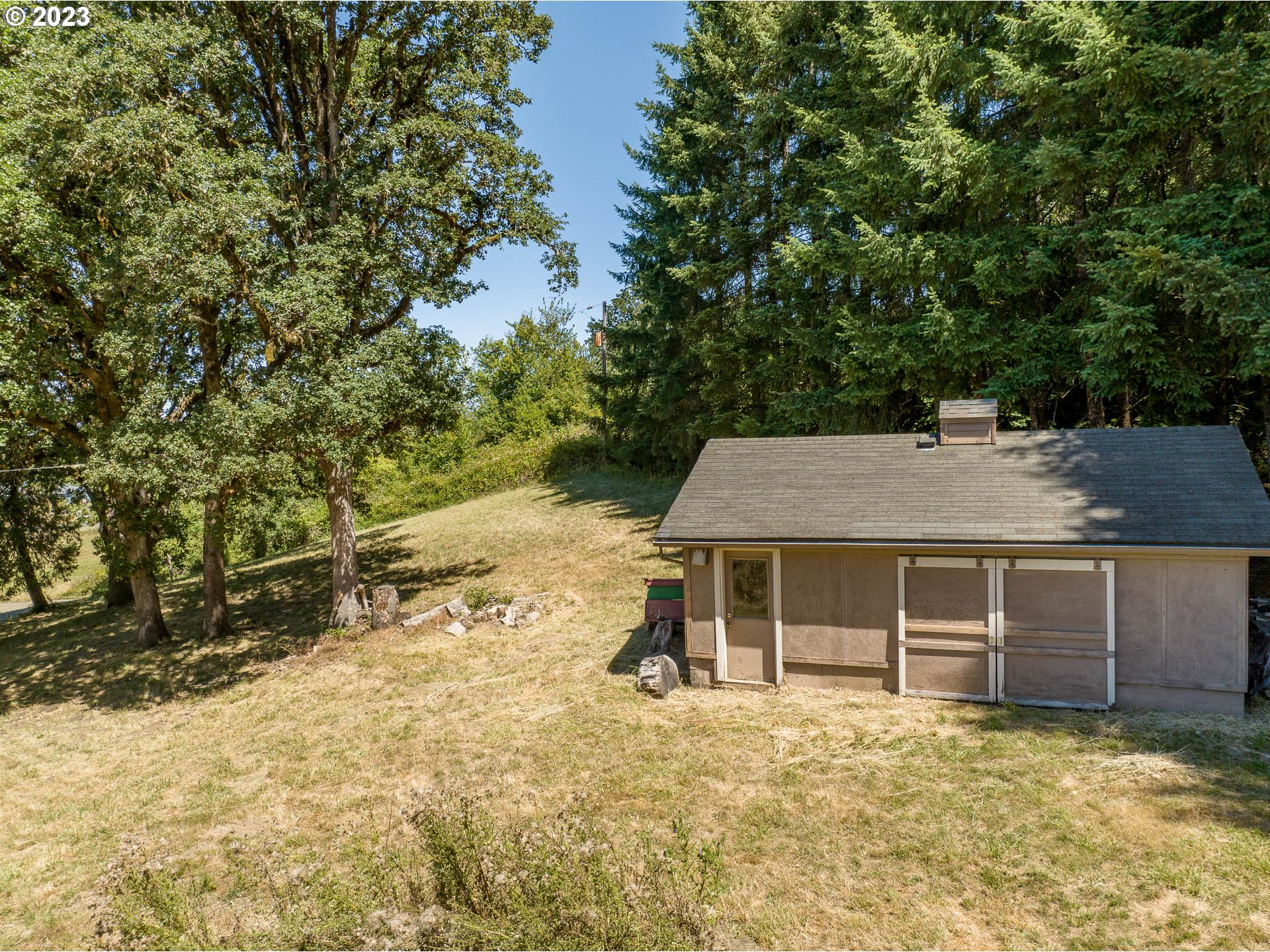 12750 Clow Corner Road Dallas, OR 97338 - Photo 38 of 43 a front view of a house with a yard