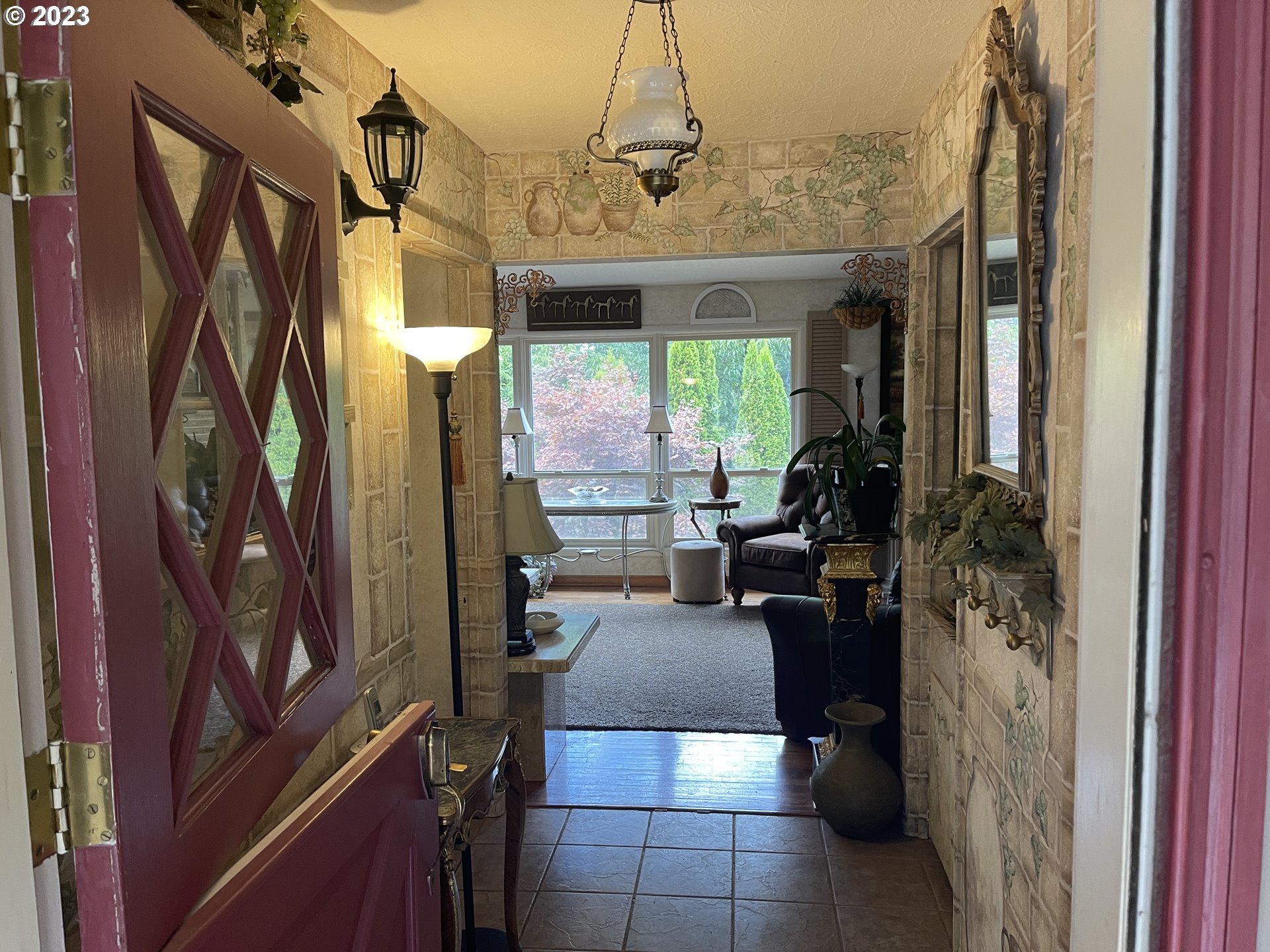 12750 Clow Corner Road Dallas, OR 97338 - Photo 6 of 43 a hallway with a couch