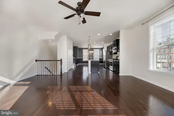 wooden floor with a window in a room