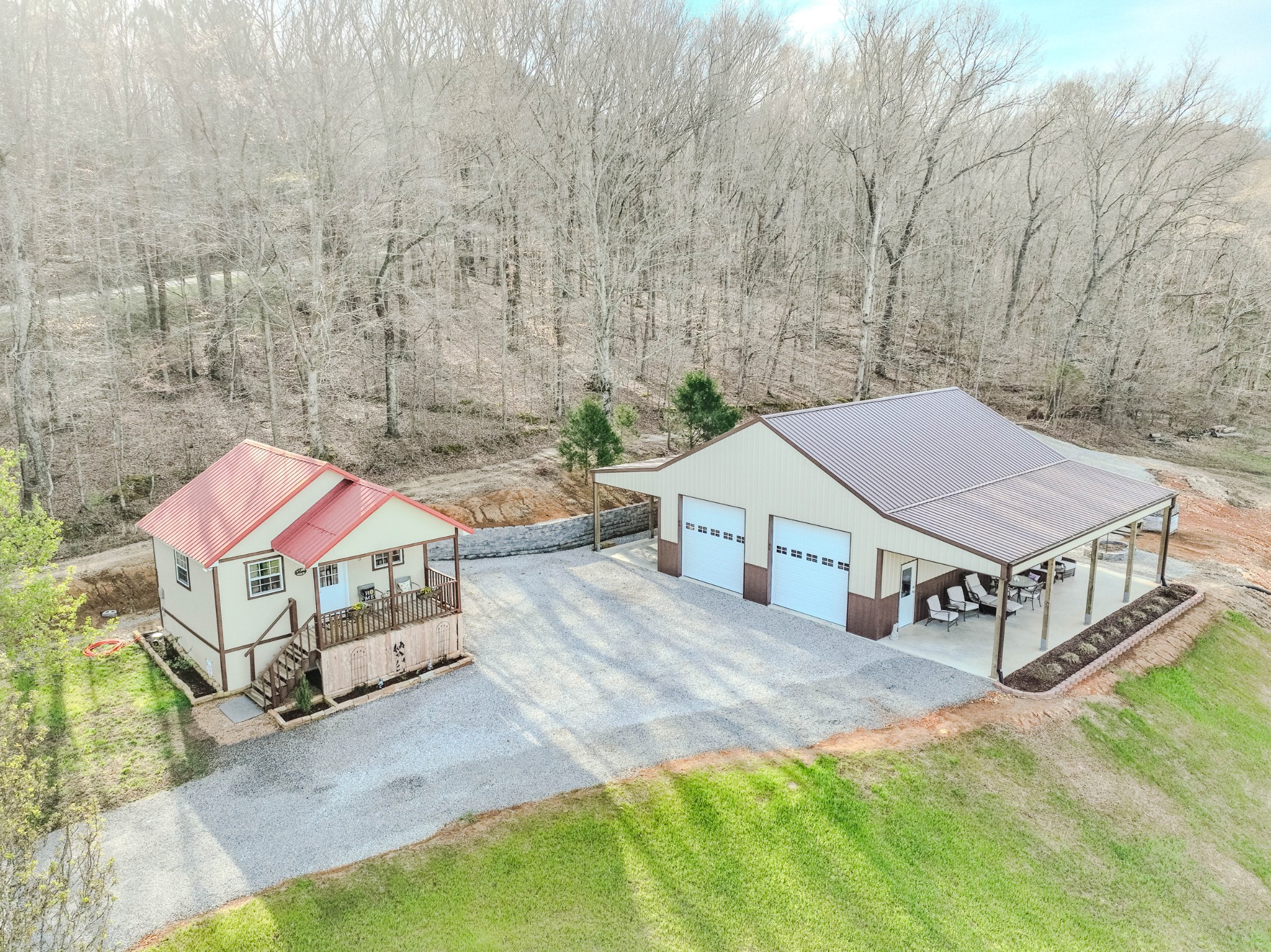 109 Rascal Town Road Loretto, TN 38469 - Photo 2 of 43 a view of a house with roof deck front of house
