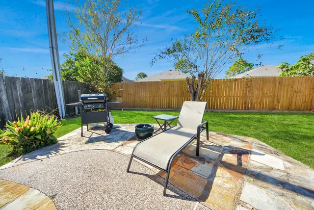 a view of a backyard with a garden