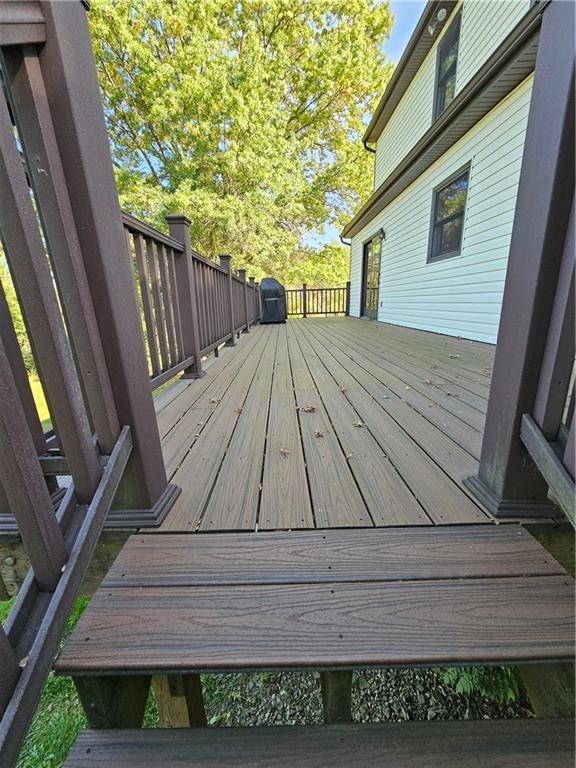 1015 McElree Road Washington, PA 15301 - Photo 11 of 48 a view of backyard with wooden deck and outdoor seating