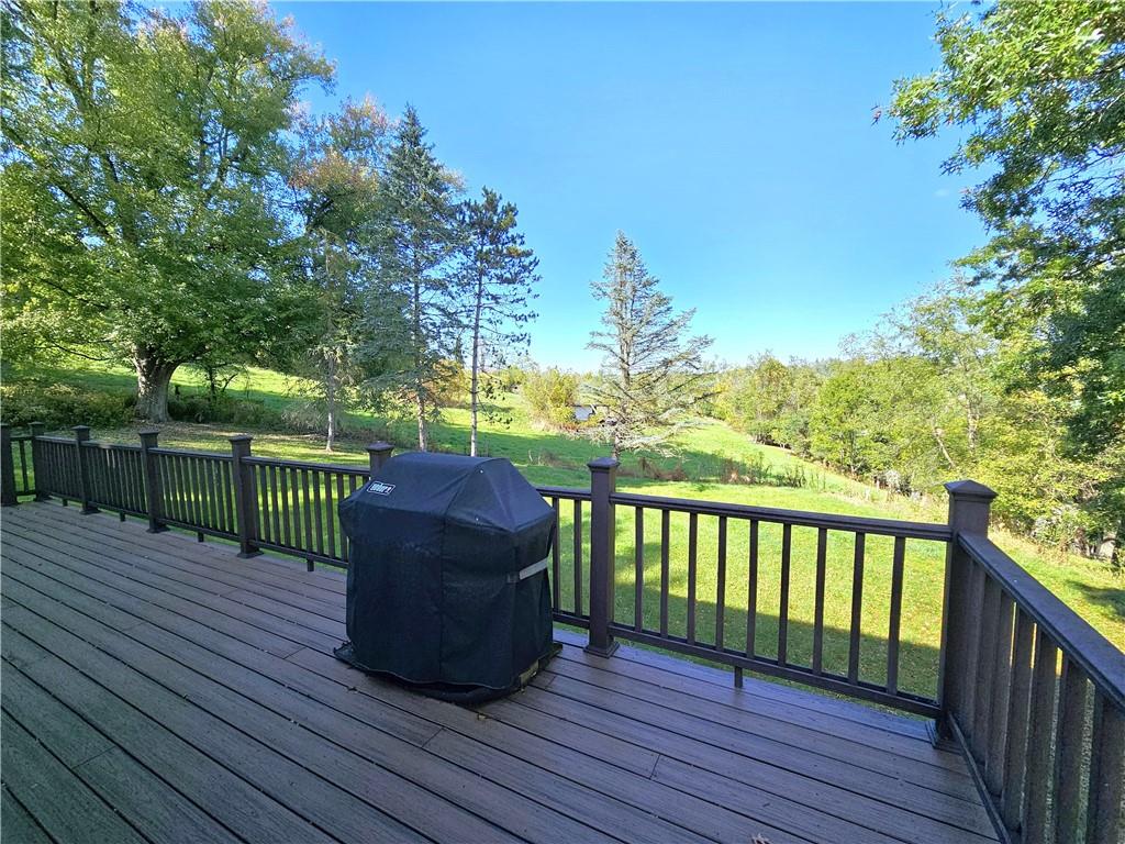 1015 McElree Road Washington, PA 15301 - Photo 14 of 48 a view of a deck with a floor to ceiling window and wooden fence