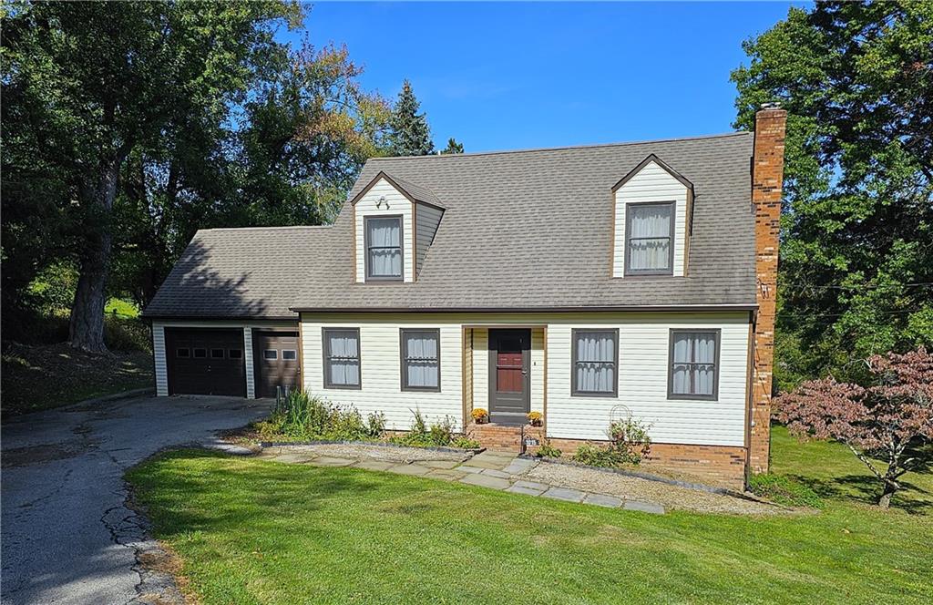 1015 McElree Road Washington, PA 15301 - Photo 2 of 48 a front view of a house with a yard