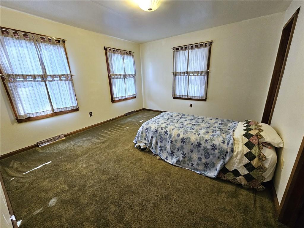 1015 McElree Road Washington, PA 15301 - Photo 29 of 48 a bedroom with a bed and a window