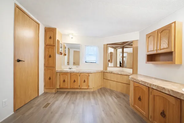 a view of a kitchen with washer and dryer