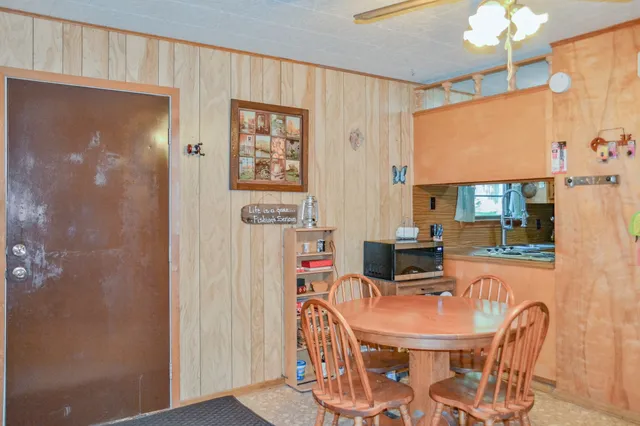 a bathroom with a shower and a mirror