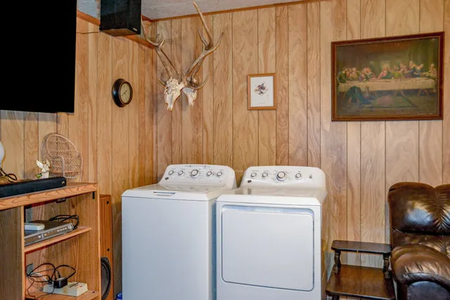 a view of a lake with a house in the background