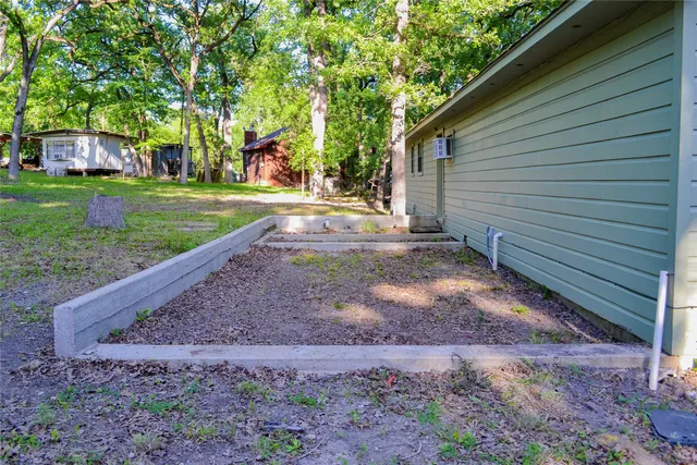 a view of a lake with a house in the background