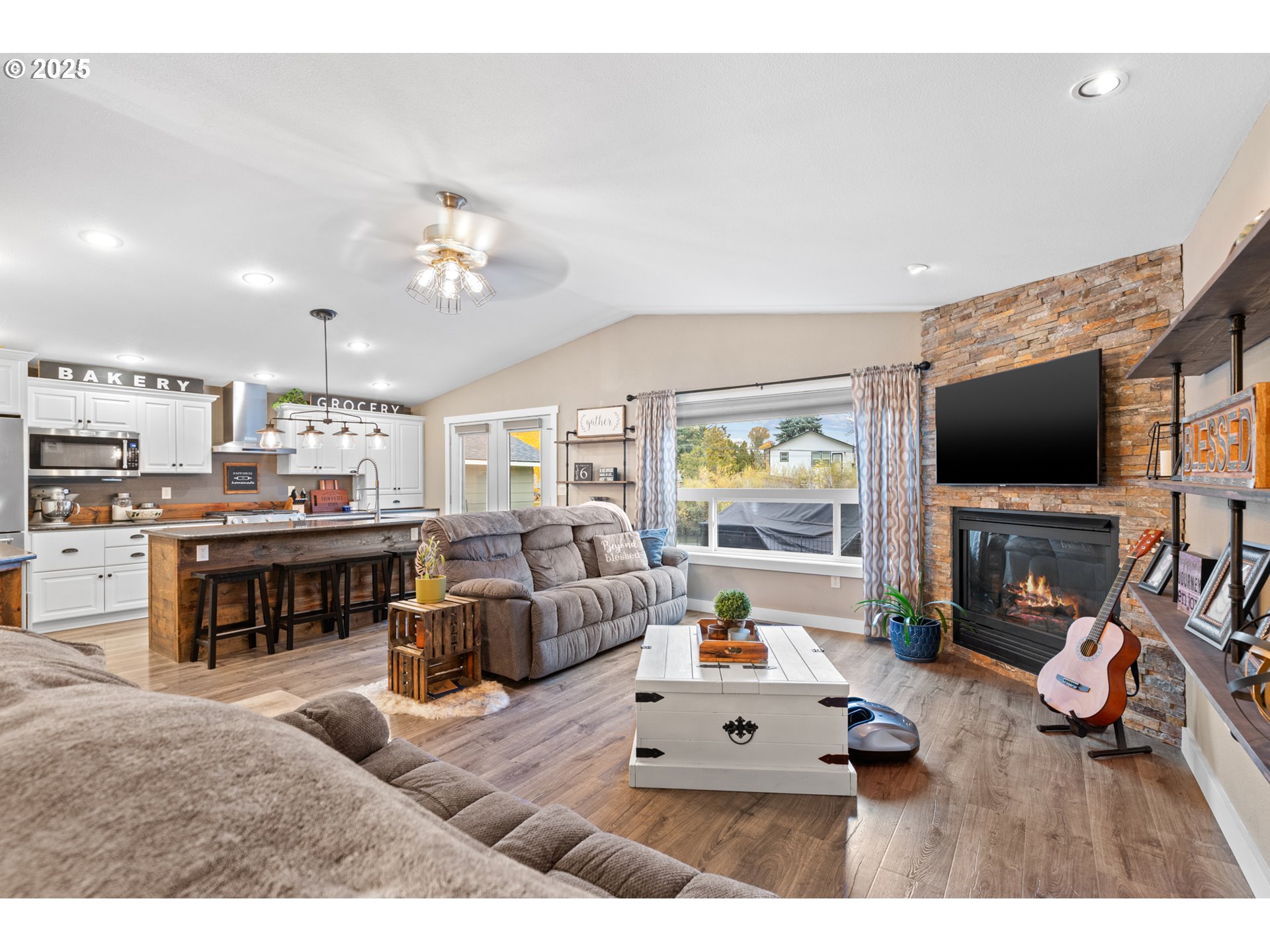 1328 Southwest 44th Street Pendleton, OR 97801 - Photo 11 of 43 a living room with furniture and a flat screen tv