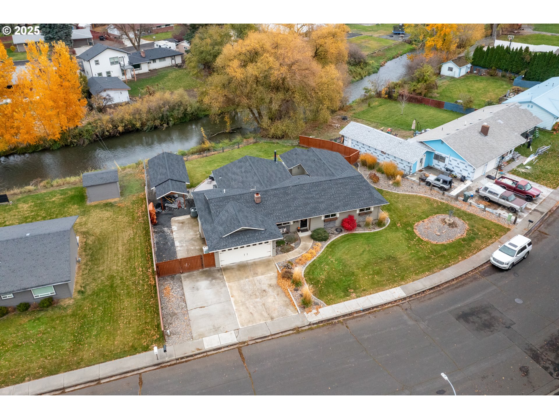 1328 Southwest 44th Street Pendleton, OR 97801 - Photo 2 of 43 an aerial view of a house with a lake view
