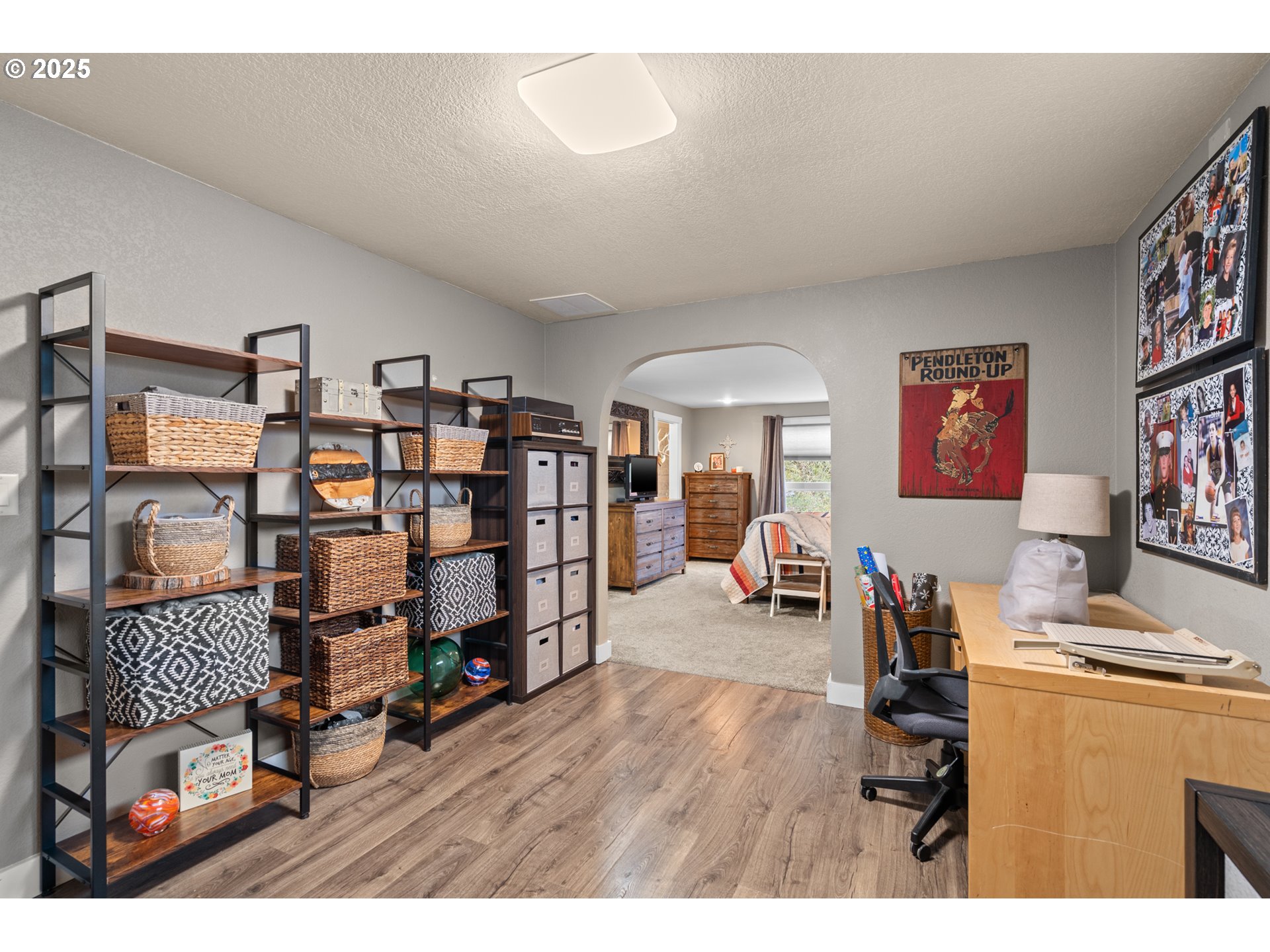 1328 Southwest 44th Street Pendleton, OR 97801 - Photo 23 of 43 a living room with furniture and a book shelf
