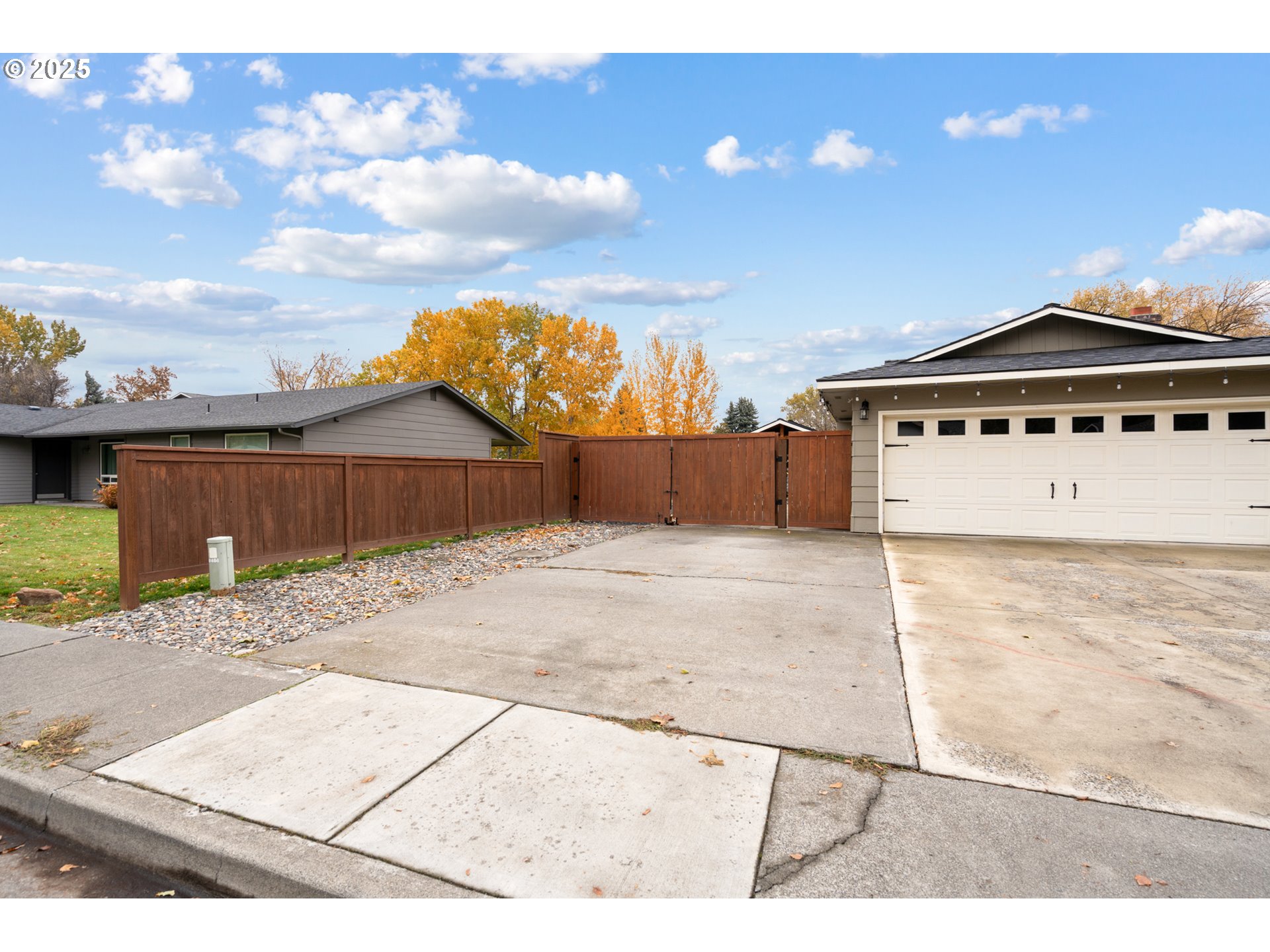 1328 Southwest 44th Street Pendleton, OR 97801 - Photo 32 of 43 a front view of a house with a yard and garage