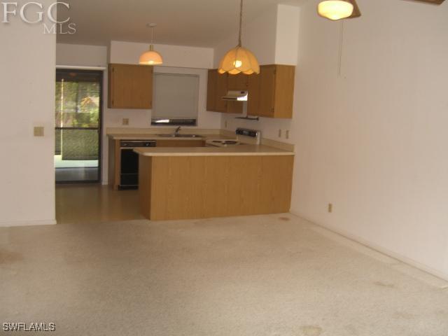 18221 Matanzas Road Fort Myers, FL 33967 - Photo 2 of 10 a room with a sink and a mirror