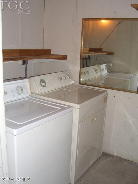 18221 Matanzas Road Fort Myers, FL 33967 - Photo 4 of 10 a utility room with dryer and washer