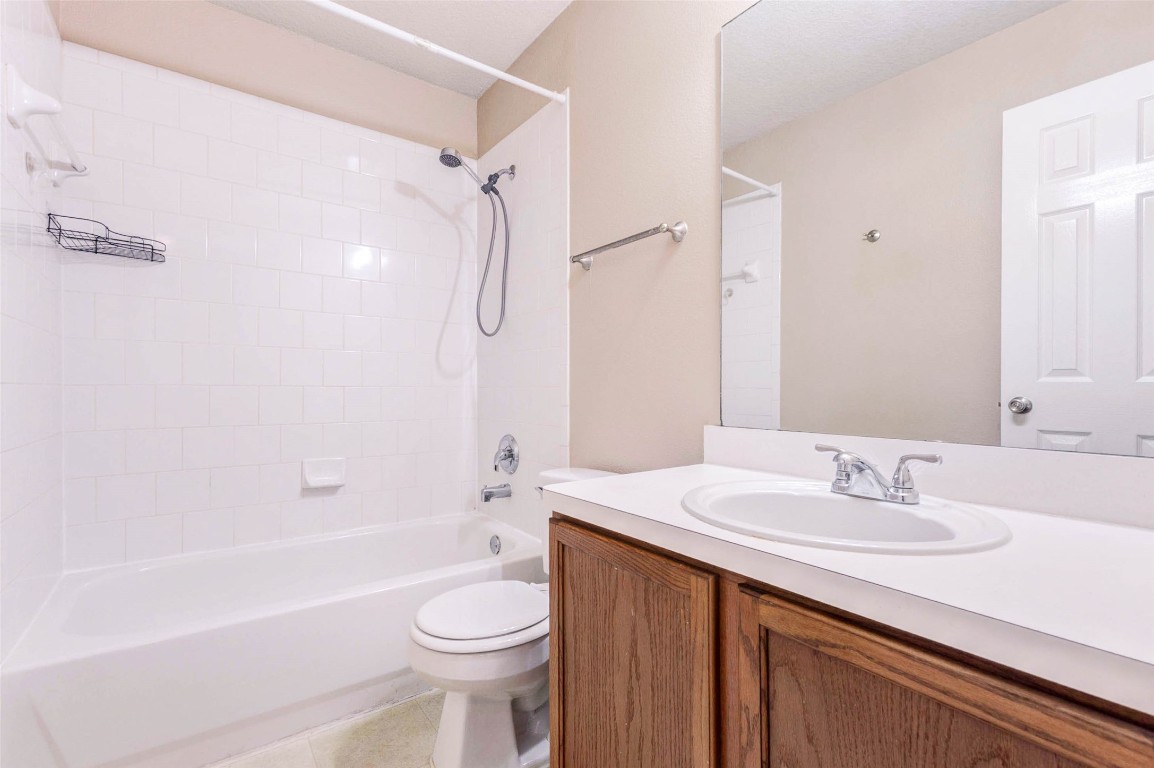 18327 Atasca Wds Trace Humble, TX 77346 - Photo 24 of 28 a bathroom with a sink a toilet and a bathtub
