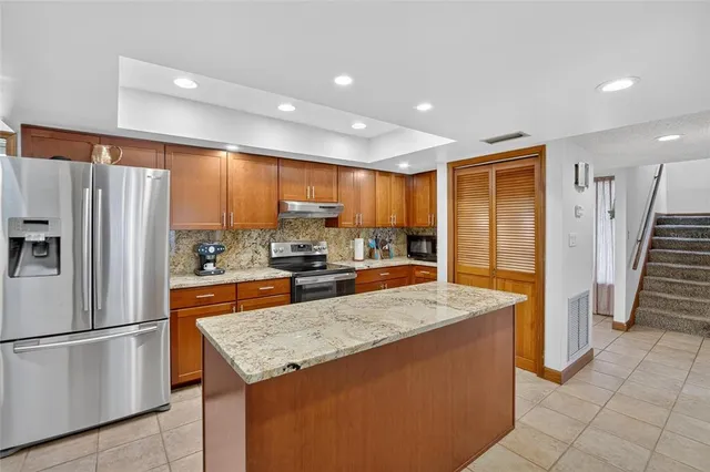 a outdoor space with lots of furniture and outdoor seating