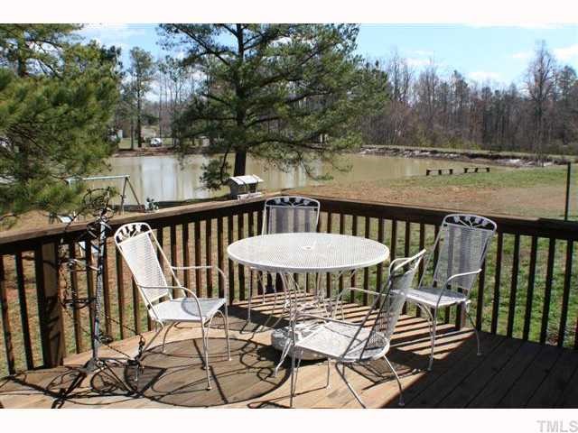 4072 Raney Way Drive Stem, NC 27581 - Photo 2 of 12 CLICK PICTURE TO ENLARGE - This could be your back deck with view of this beautiful calm water, what a nice place to sit back & relax or perfect for entertaining guest while grilling out! Bring your own fishing poles! Potential for building your own dock.