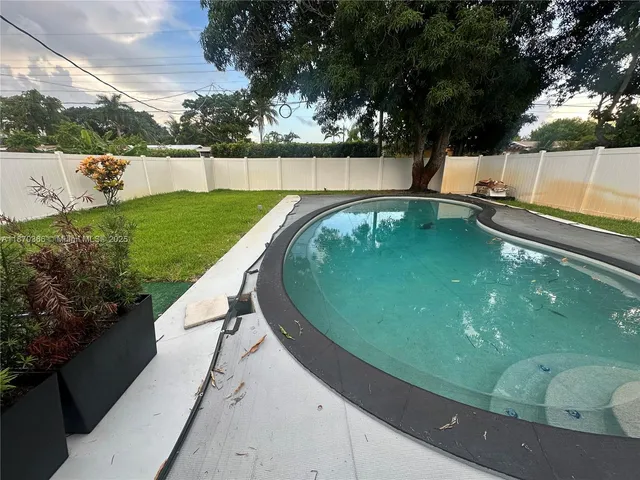 a view of a lake from a yard