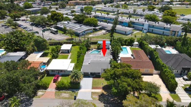 an aerial view of city and lake