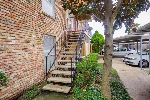 a view of swimming pool with a patio