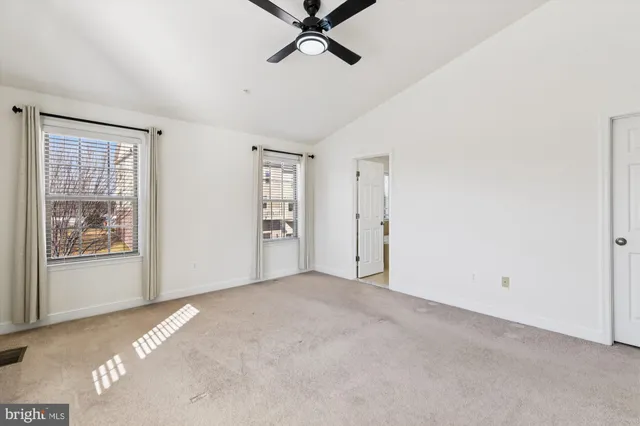 an empty room with windows