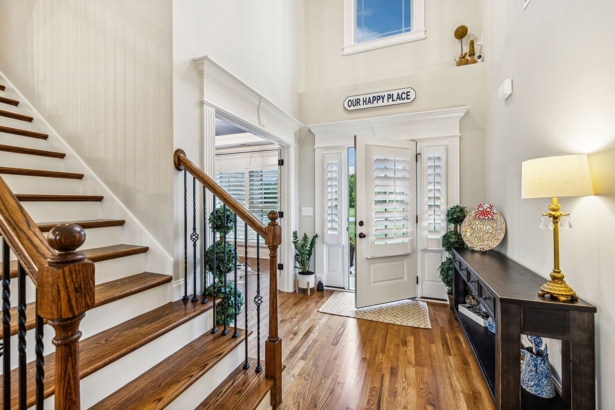 718 Walnut Grove Road Christiana, TN 37037 - Photo 5 of 49 a view of a hallway with wooden floor and staircase