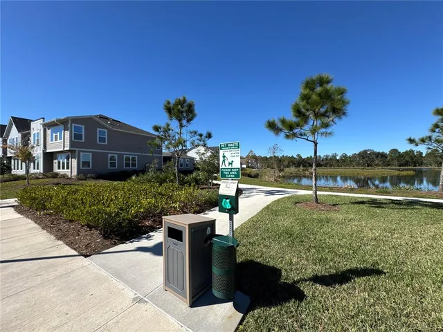 a view of a house with a small yard