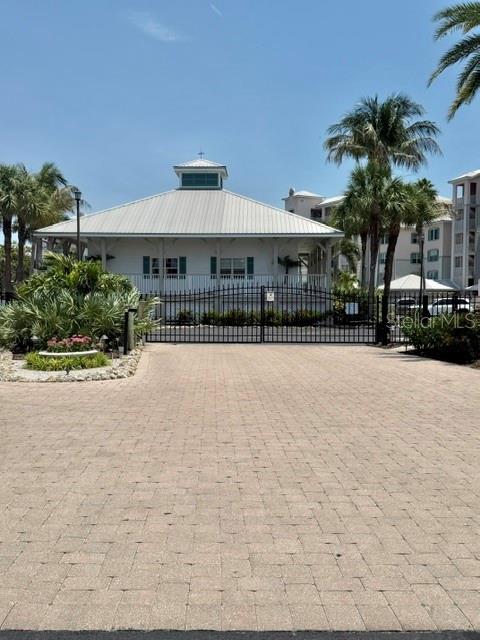 13413 Gasparilla Road, Unit 304 Placida, FL 33946 - Photo 27 of 28 a house view with a garden space