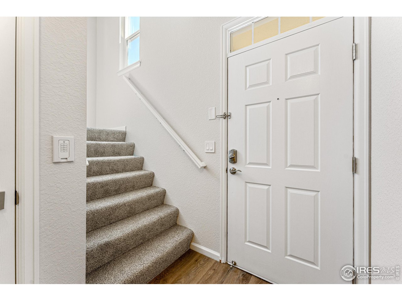 4501 Nelson Road, Unit 2405 Longmont, CO 80503 - Photo 17 of 30 Main Level Entry New LV Floors & Carpet!