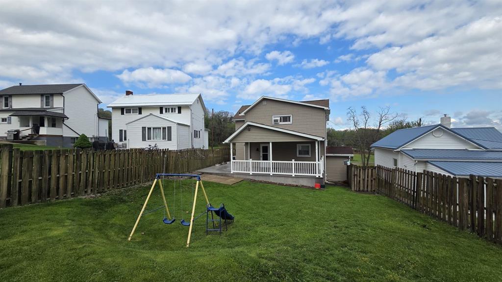 725 Longfellow Street Vandergrift, PA 15690 - Photo 12 of 14 a house view with a garden space