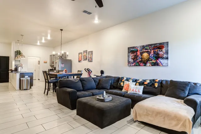 a living room with furniture and a couch