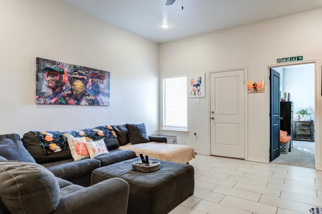 a living room with furniture and a couch
