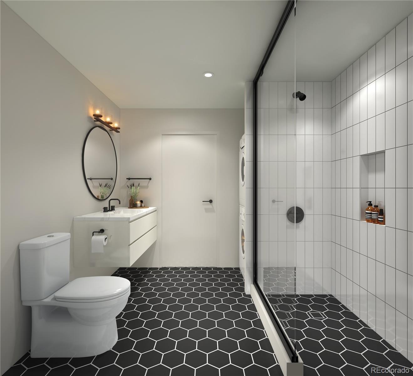 2120 North Downing Street, Unit 203 Denver, CO 80205 - Photo 3 of 10 a bathroom with a toilet a sink and shower