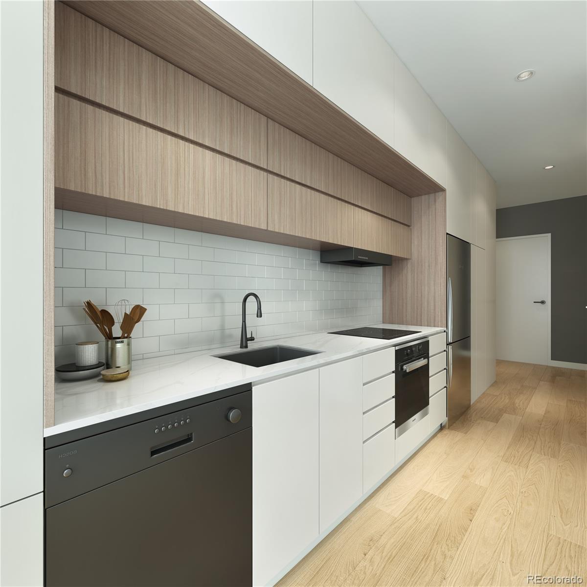 2120 North Downing Street, Unit 203 Denver, CO 80205 - Photo 6 of 10 a kitchen with a sink dishwasher a stove and cabinets