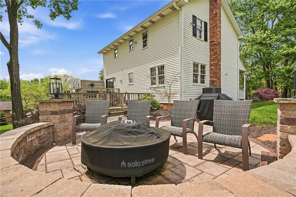 267 Forsythe Road Mars, PA 16046 - Photo 36 of 41 a view of a patio with couches table and chairs and potted plants