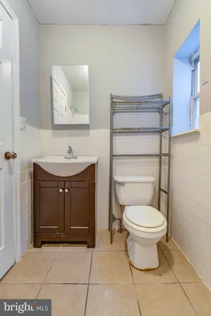 a view of balcony with wooden floor and fence